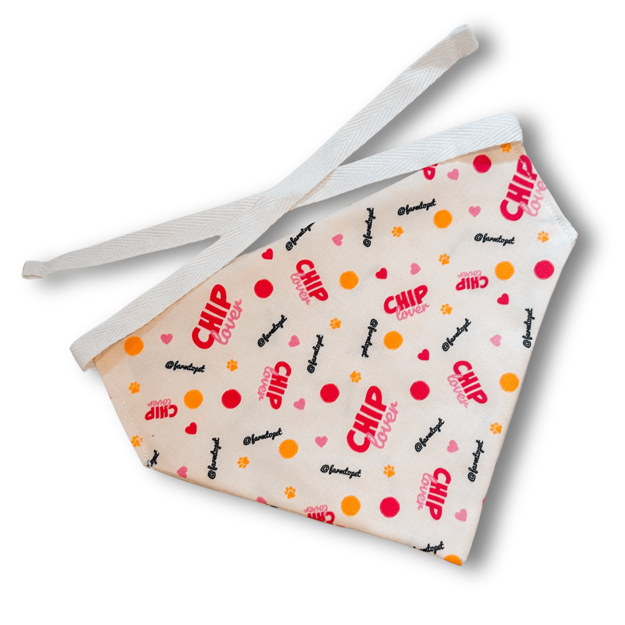 Product picture of Farmto-pettreats white bandana with red Chip Lover and @farm to pet red and yellow circle's and pink hearts on a white background.