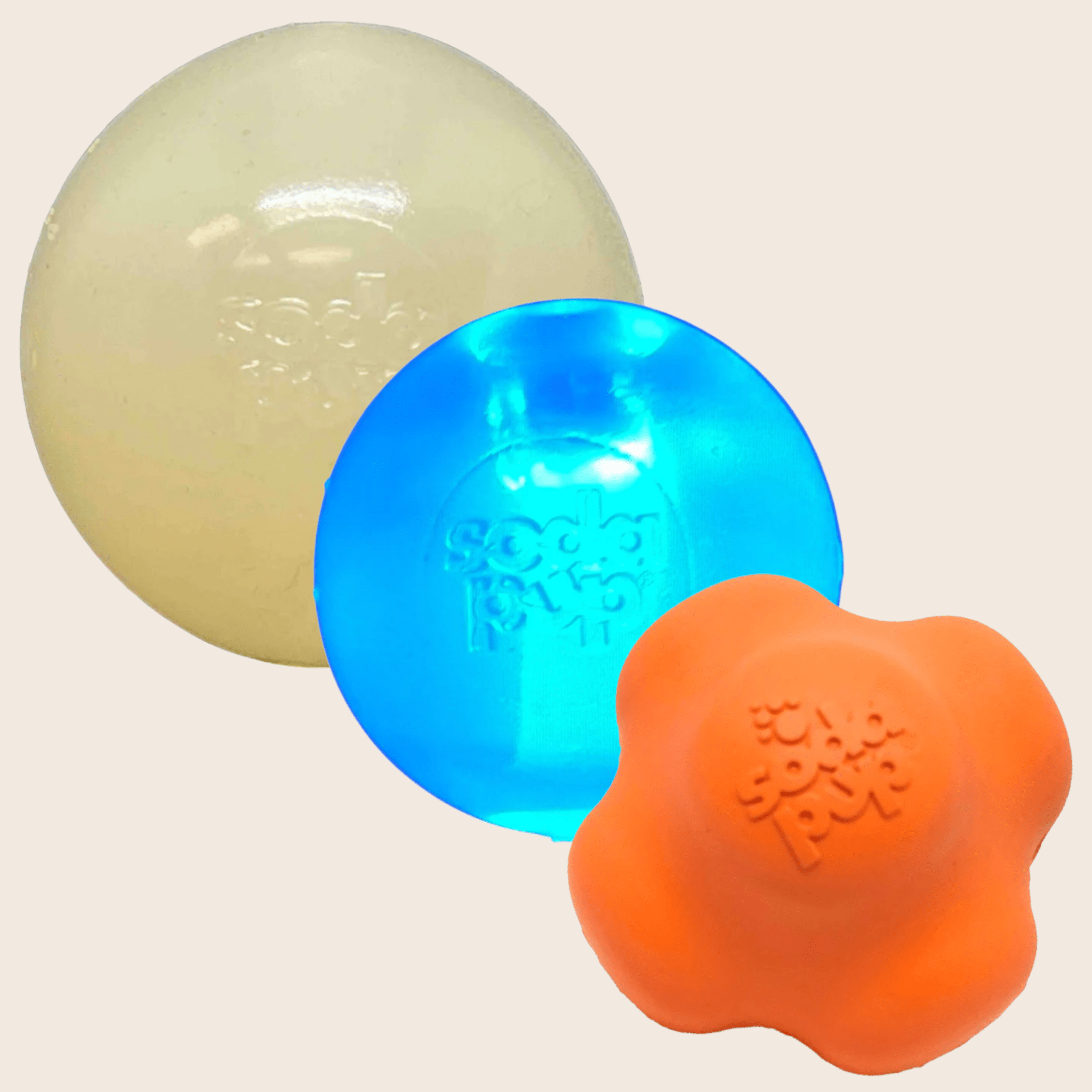 Farmto-pettreats Dog Fetch Balls Three colorful rubber balls on a beige background