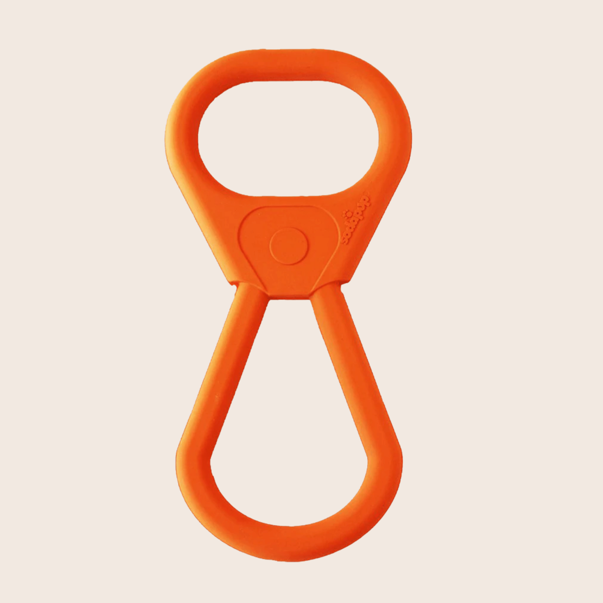 A Closeup of Farmto-pettreats Pop Top Tug Orange tug on a beige background.
