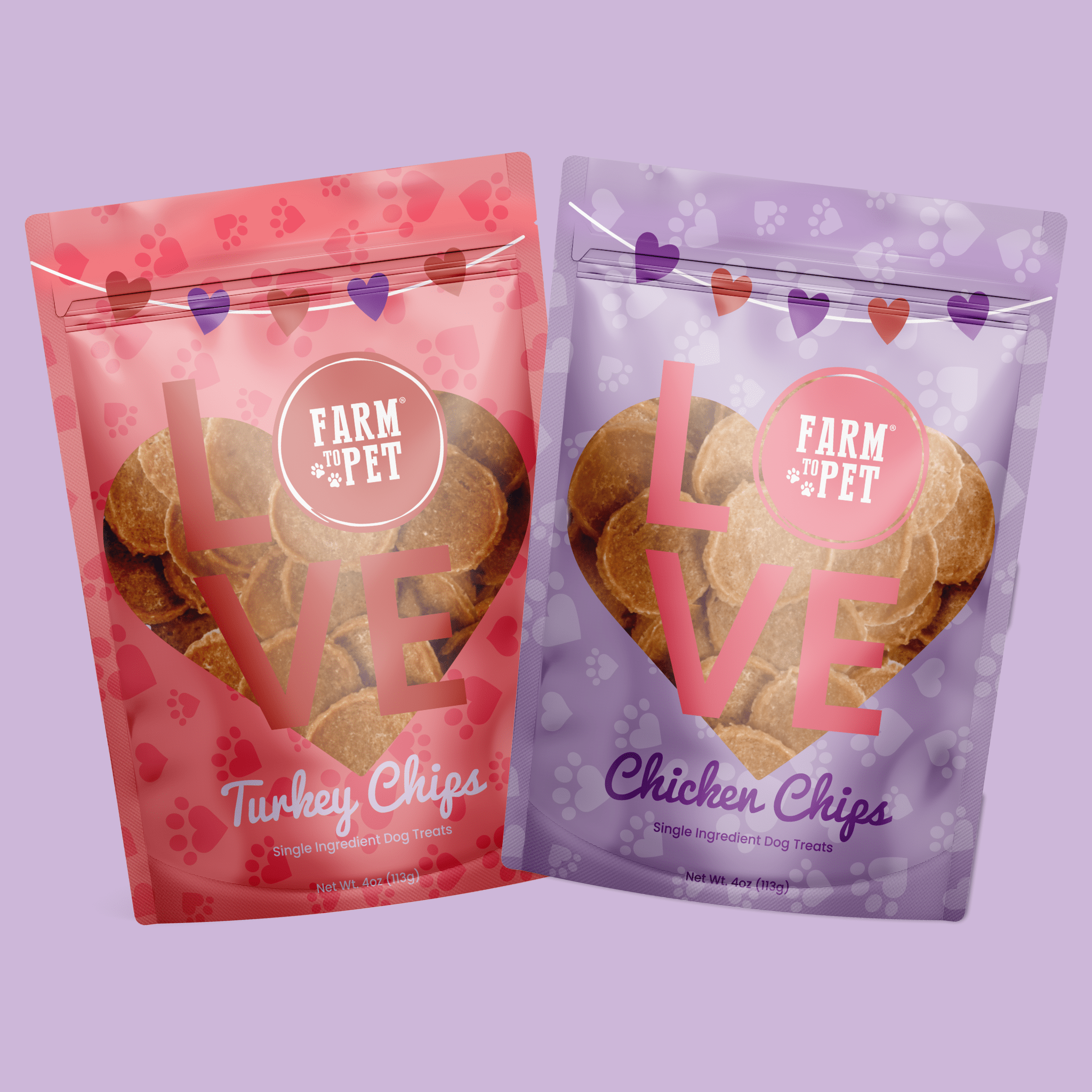 Two packages of Farmto-pettreats Puppy Love dog treats one pink and one purple on a light purple background with hearts.