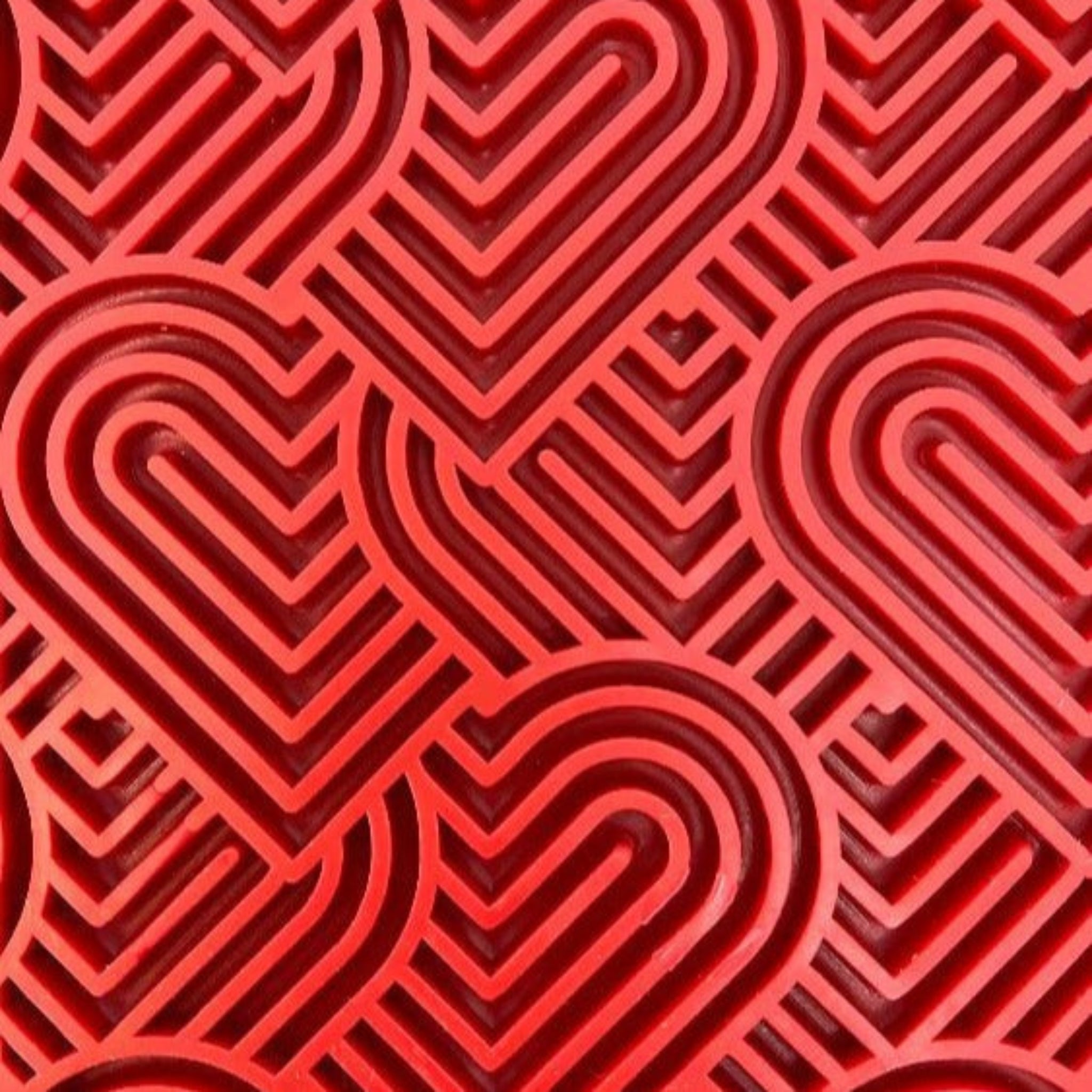 A product picture of a Farmto-pettreats and Sodapup red Heart Lickmat.